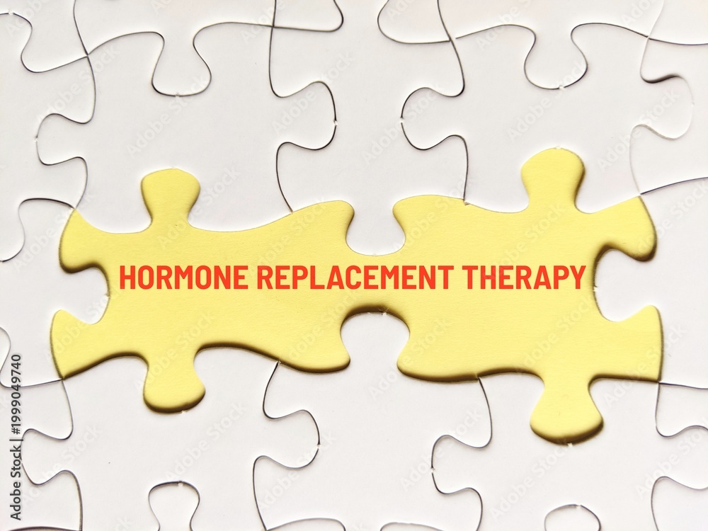 Fototapeta premium business concept puzzle. Jigsaw puzzle and yellow background with the word hormone replacement therapy