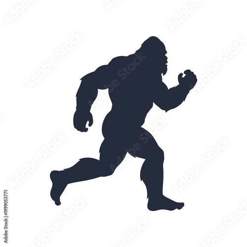 Dark black silhouette of Bigfoot or Sasquatch walking in profile, isolated on white background. Cryptid creature in mid-stride showing muscular build and large hairy body.