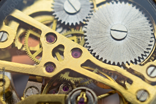 Foto Macro photo of the mechanism of an old mechanical pocket watch
