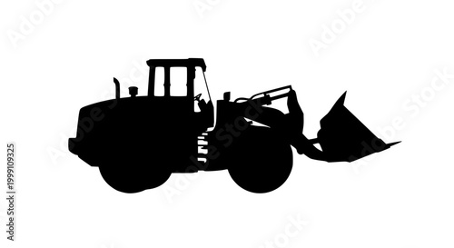 Silhouette of a heavy duty front end loader wheel loader machine