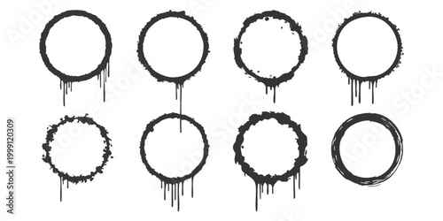 Set of black spray paint circles with dripping ink textures and rough grunge edges for street art design elements