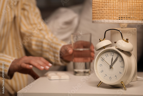 Young woman with glass of w...