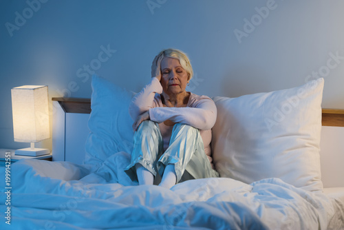Senior woman suffering from...