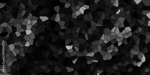 Grayscale abstract mosaic background with irregular geometric polygons and contrasting light and dark shades for a textured visual effect