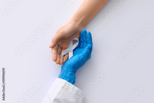 Hands of female doctor and ...