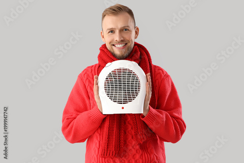 Young man in winter clothes...