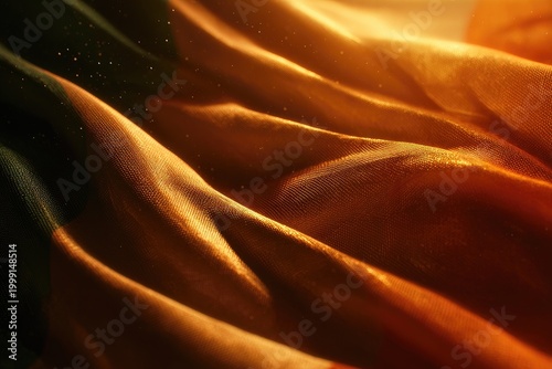 Rippling fabric with golden light and subtle green hues