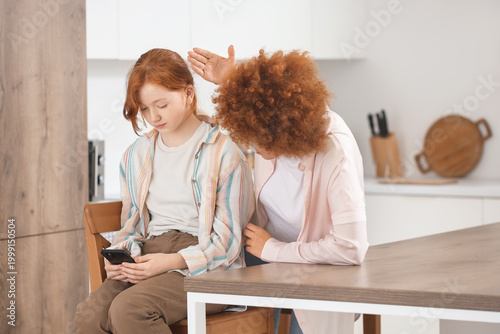 Redhead mother squabbling w...