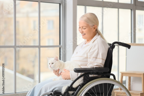 Mature woman in wheelchair ...