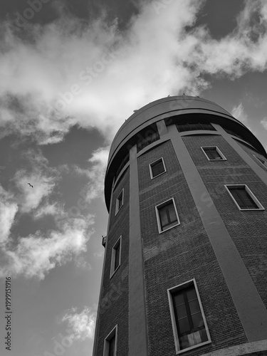 Ostia, Rome, Italy - October 20, 2025, perspective detail of the Acea Tower in Ostia, with the sign of the Ostia Batteria Alto water center, owned by Acea S.p.A.