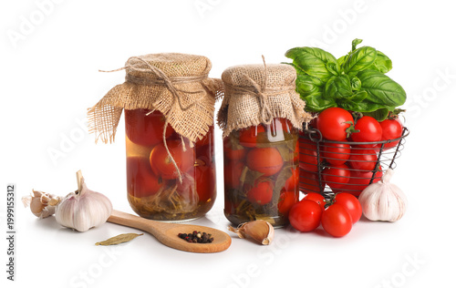 Jars of canned tomatoes and...
