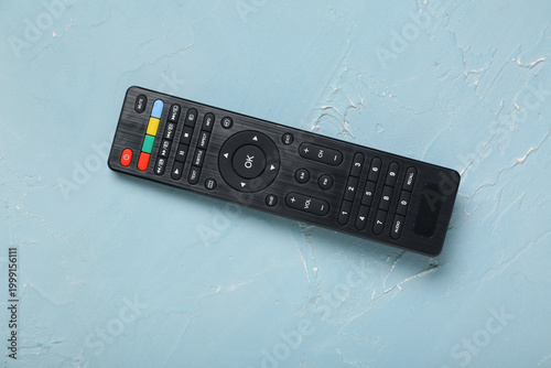 Modern TV remote control on...