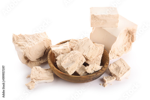 Wooden bowl with pieces of ...