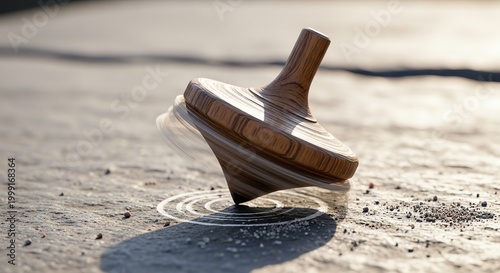 A classic wooden spinning top toy rotating on a textured stone surface with warm sunlight and depth of field
