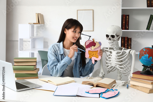Female student with paper d...