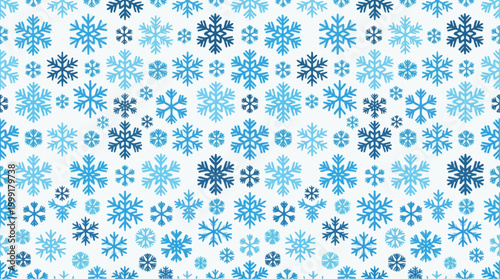 An artistic and whimsical pattern of snowflakes in shades of blue adorns this image. this illustration evokes a sense of winter's charm and the beauty of natural geometry.