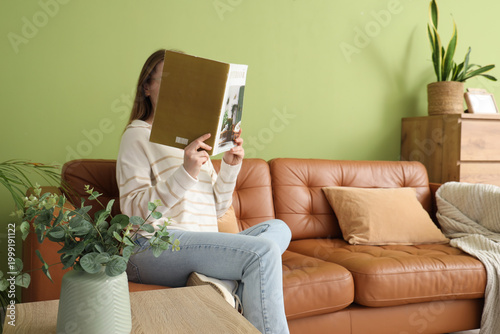 Woman reading interior desi...