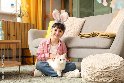 Cute little boy in bunny ea...