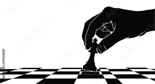 Hand moving chess piece on board strategy game concept black and white