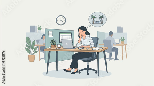 Woman working on laptop at office desk with coworkers nearby