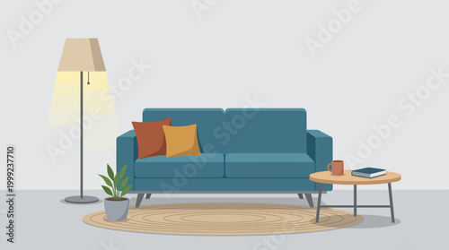 Teal sofa with orange pillows indoors.