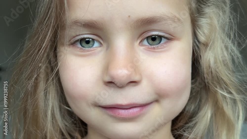 Little girl smiling. Beautiful little girl smiles for the camera. Portrait
