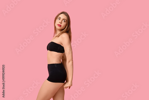 Sexy young woman in black u...
