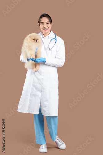 Female veterinarian with cu...