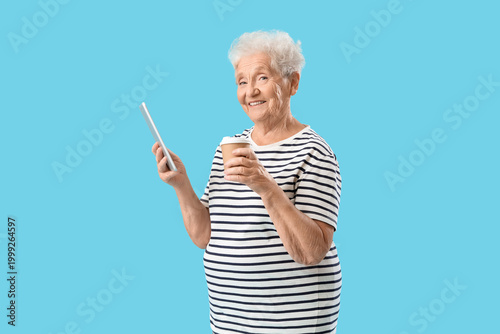 Senior woman with tablet co...