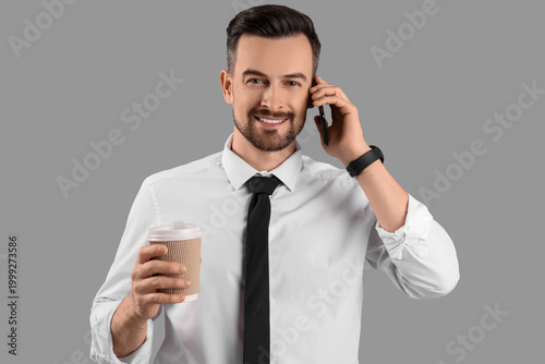 Smiling businessman talking...