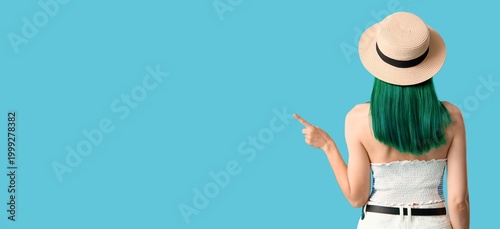 Pretty young woman with gre...