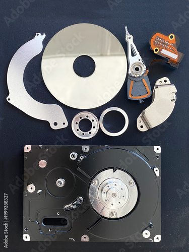 Close-up view of a disassembled single-platter vintage hard drive