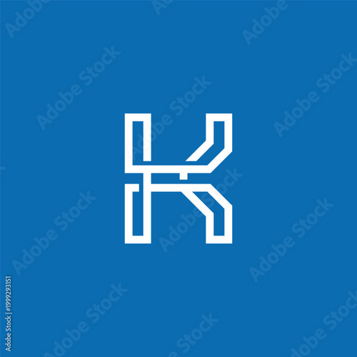 Minimalist geometric letter K logo design on a vibrant blue background