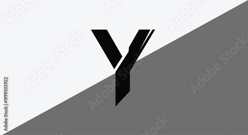 Bold black letter y positioned centrally on a diagonal split background of white and grey for a modern typographic composition.