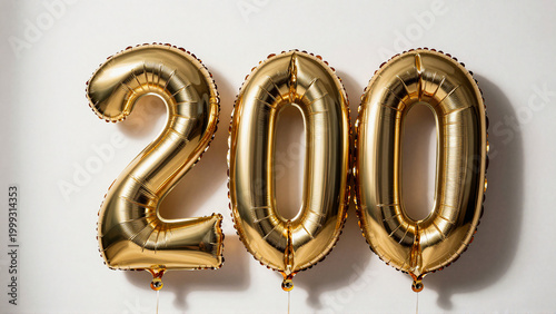 Shining metallic number two hundred foil balloons celebrating a significant milestone, anniversary, or special accomplishment with festive joy