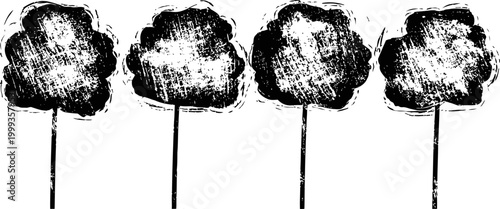 Four vintage cotton candy sticks with fluffy sugary texture on white background