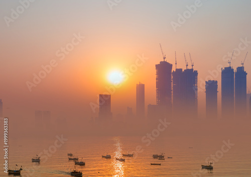 Obraz na plátně Air pollution concept - Modern highrise rich buildings and poor slums at sunset