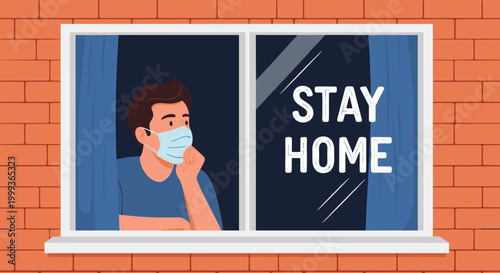 Young man wearing a protective surgical mask looking out of a window with stay home message, illustrating life during a pandemic quarantine.