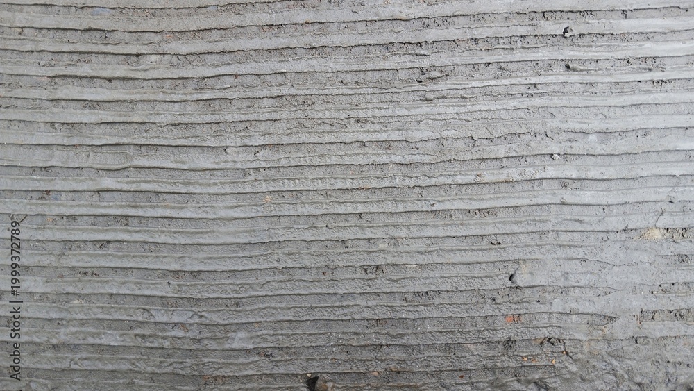 Naklejka premium Rough concrete texture with horizontal grooved lines. floor texture.