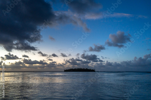 Photos Sunset over a tropical motu on Tikehau Atoll, French Polynesia