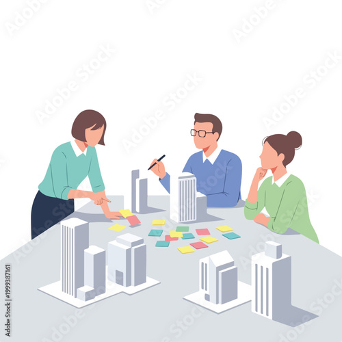 Team of architects or designers collaborating on a building project with miniature models and sticky notes