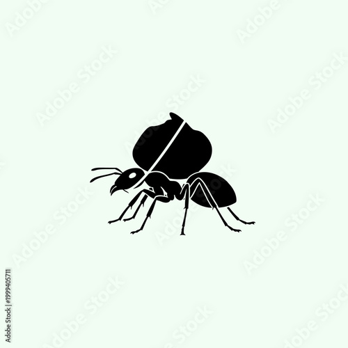 Ant carrying a load, symbol of hard work.