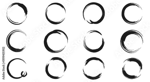 Set of black hand-drawn circular brush strokes, artistic texture elements on an isolated white background.