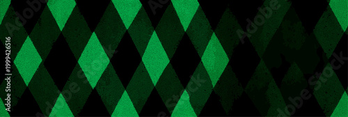Repeating geometric diamond pattern featuring dark green and black colors creating a textured graphic backdrop. Dark green and black harlequin pattern background