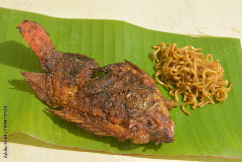 Delicious Homemade Sweet Soy Sauce Glazed Fish with Fried Noodles