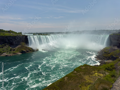 The Horseshoe Falls is the largest of the three waterfalls that collectively form Niagara Falls on the Niagara River along the Canada-United States border.
