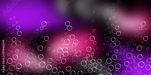 Vibrant purple and pink abstract background with floating bubbles for creative design