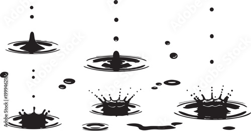 Water droplets splashing into puddles with ripples