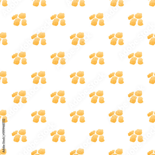 Repeating golden brown chicken nugget design creating a tasty seamless background