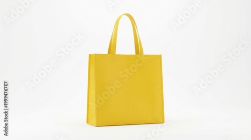 A bright yellow reusable shopping tote bag with parallel handles stands upright